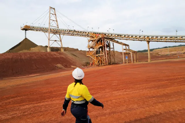 The union warns that mandatory local contracting will reduce wages and job security for 14,000 miners. Workers may strike if the government enforces the policy.