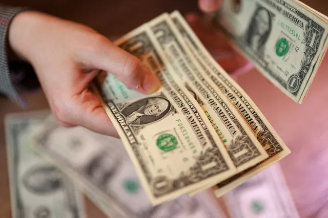 The dollar fell on Friday following reports of possible peace talks between the U.S. and Iran. Investors are now awaiting a busy week of central bank decisions.